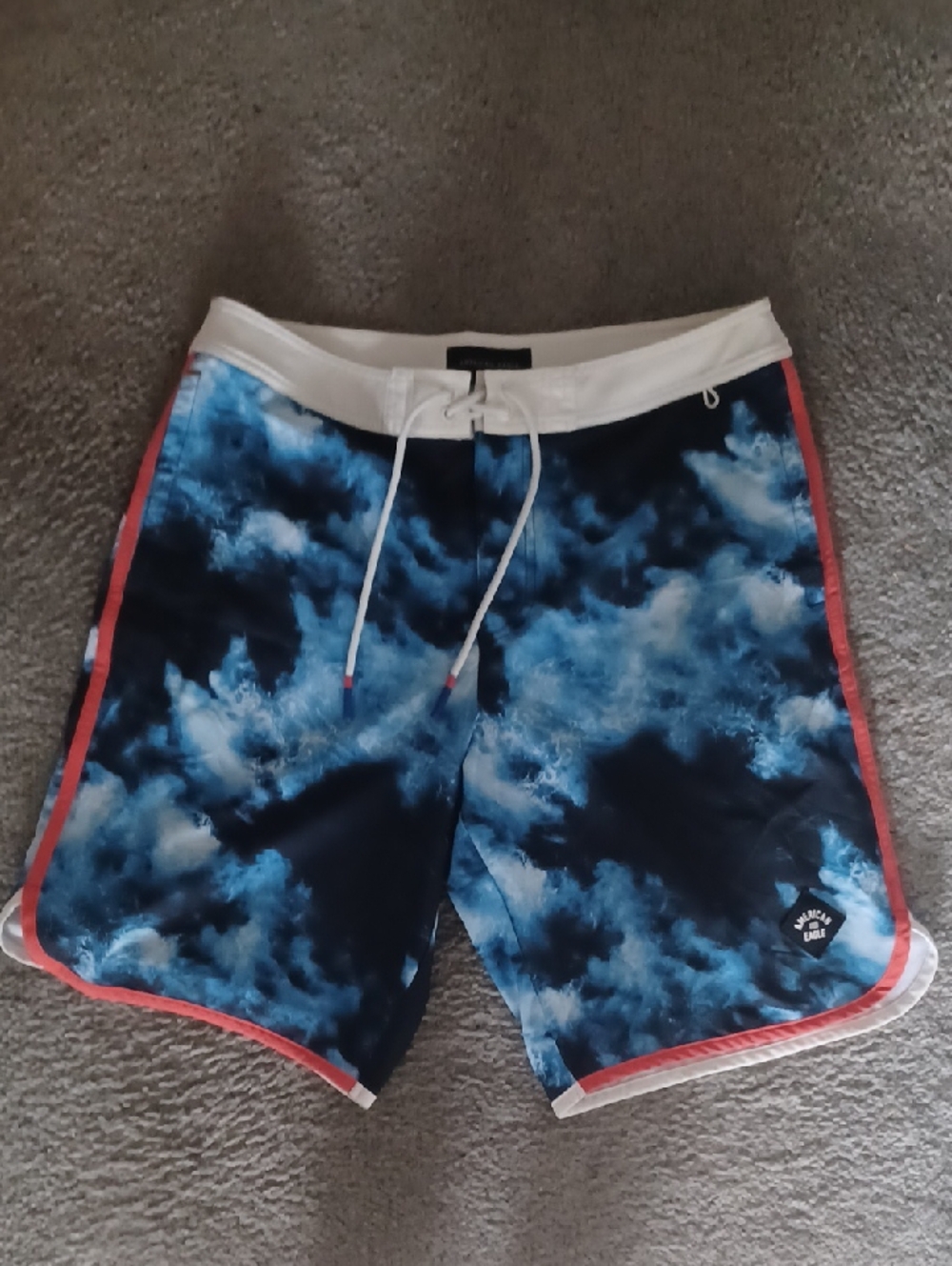 American Eagle Outfitters Blue Cloud-Print Swim Board Shorts with Coral Trim